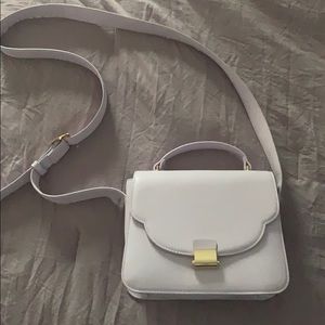 Lilac purse “a new day” brand sold at target